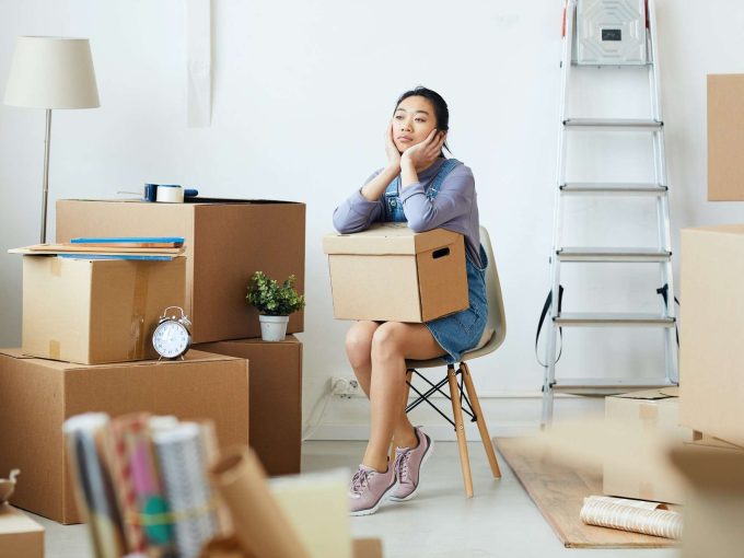 young-asian-woman-waiting-for-moving-crew.jpg